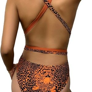 Boho tribal swimsuit crisscross cut with open back.